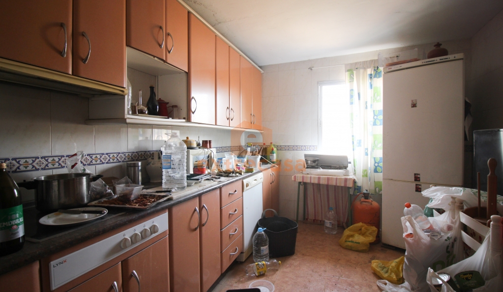 Venta de una parcela con vivienda en Botoa