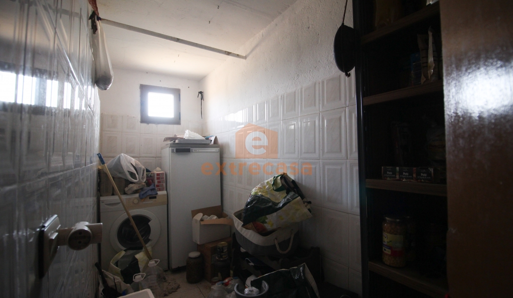 Venta de una parcela con vivienda en Botoa