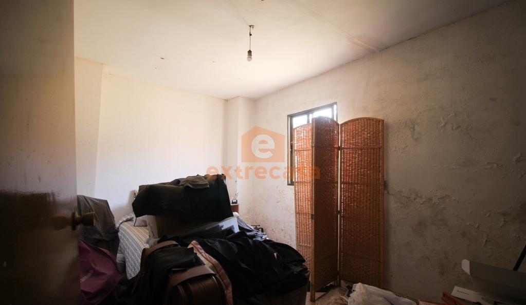 Venta de una parcela con vivienda en Botoa